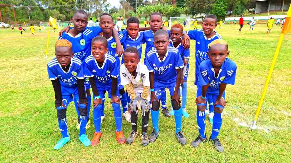 The squad in blue — matchday ready — Unity Sports Club, Nanyuki