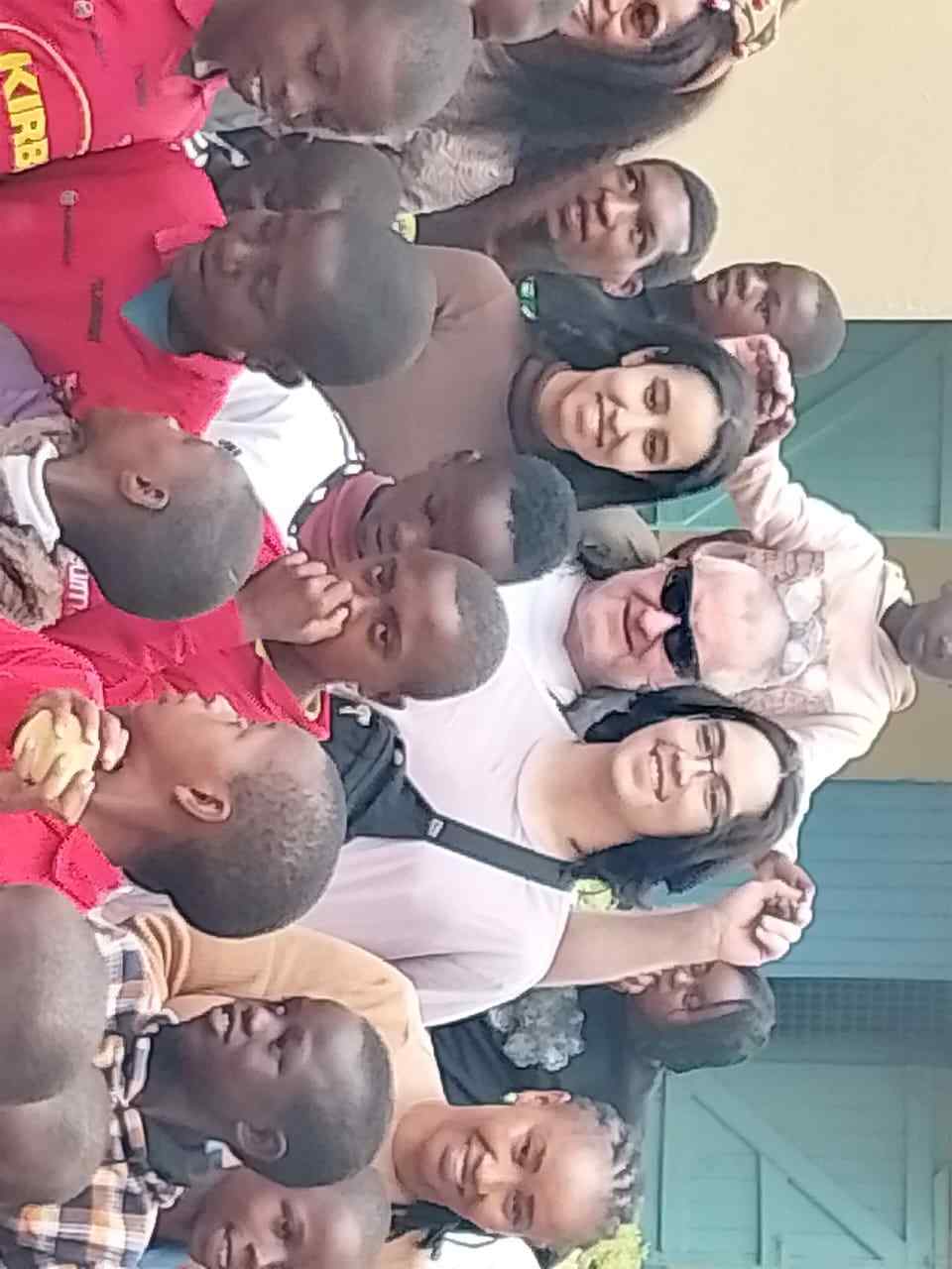 Unity Sports Club hosting foreign visitors during a donation visit