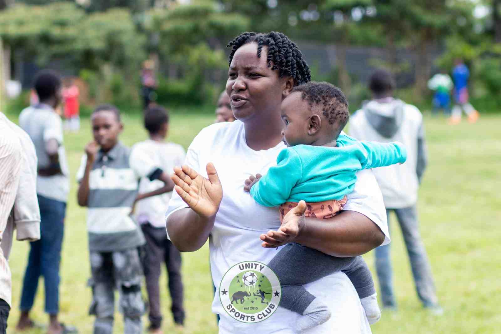 Family on the touchline — Unity Sports Club, Nanyuki