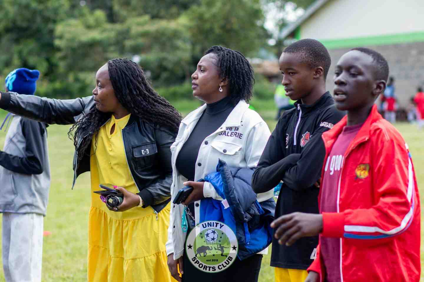 Standing tall with the coaches — Unity Sports Club, Nanyuki