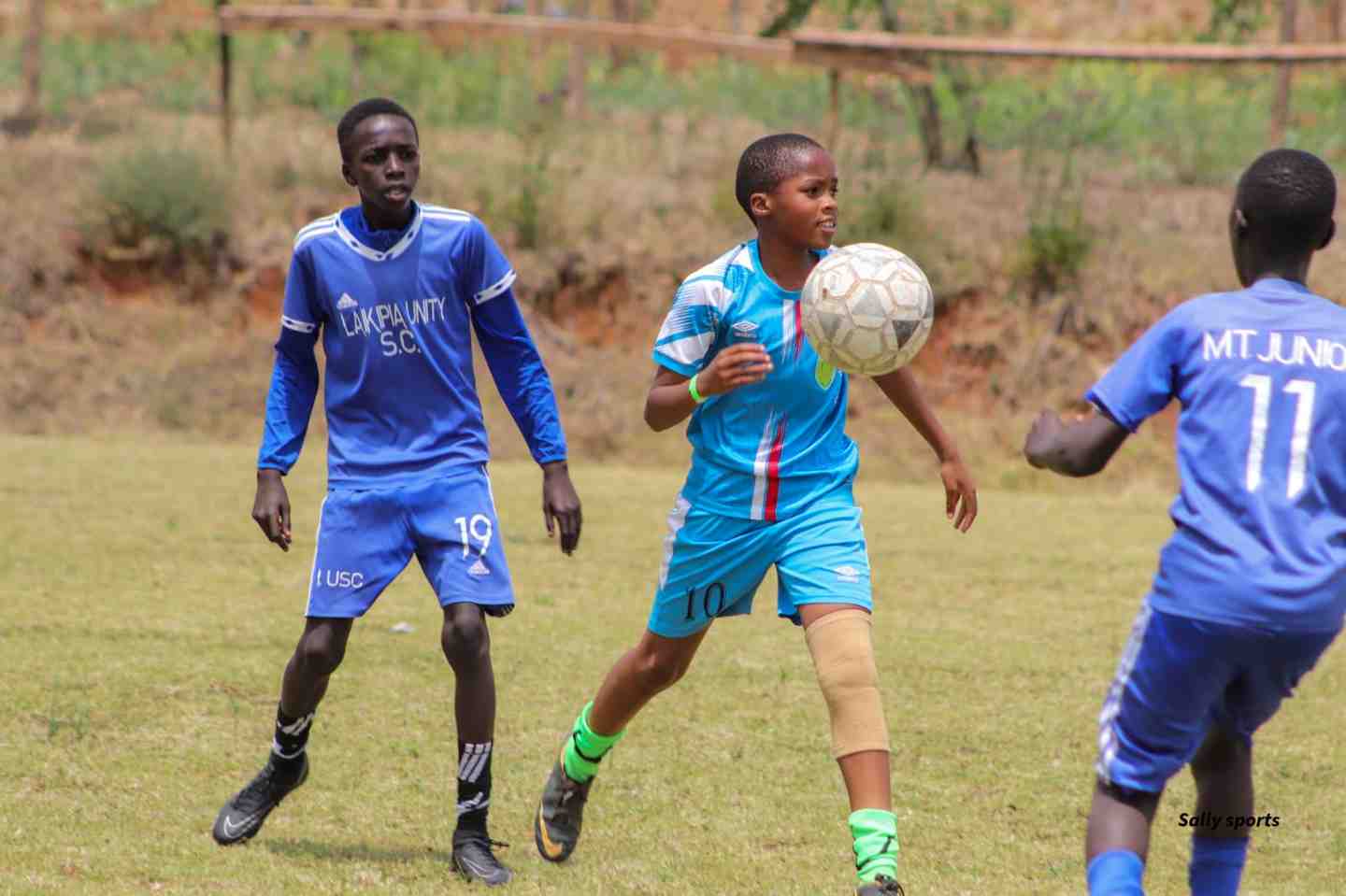 Shoulder to shoulder for the ball — Unity Sports Club, Nanyuki
