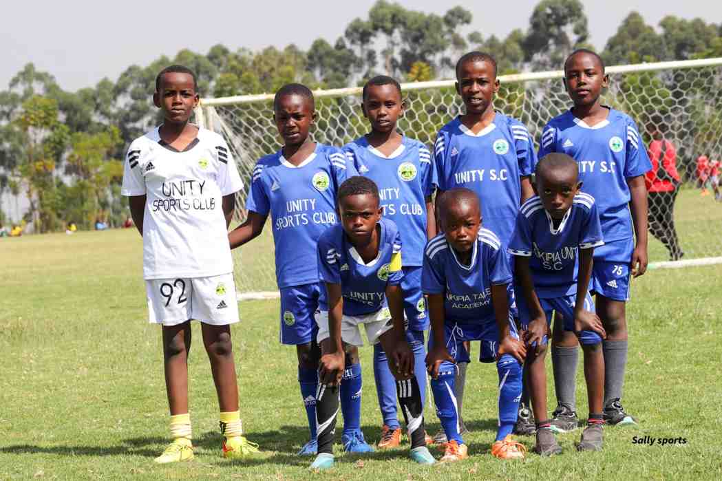 The whole family at the goalpost — Unity Sports Club, Nanyuki